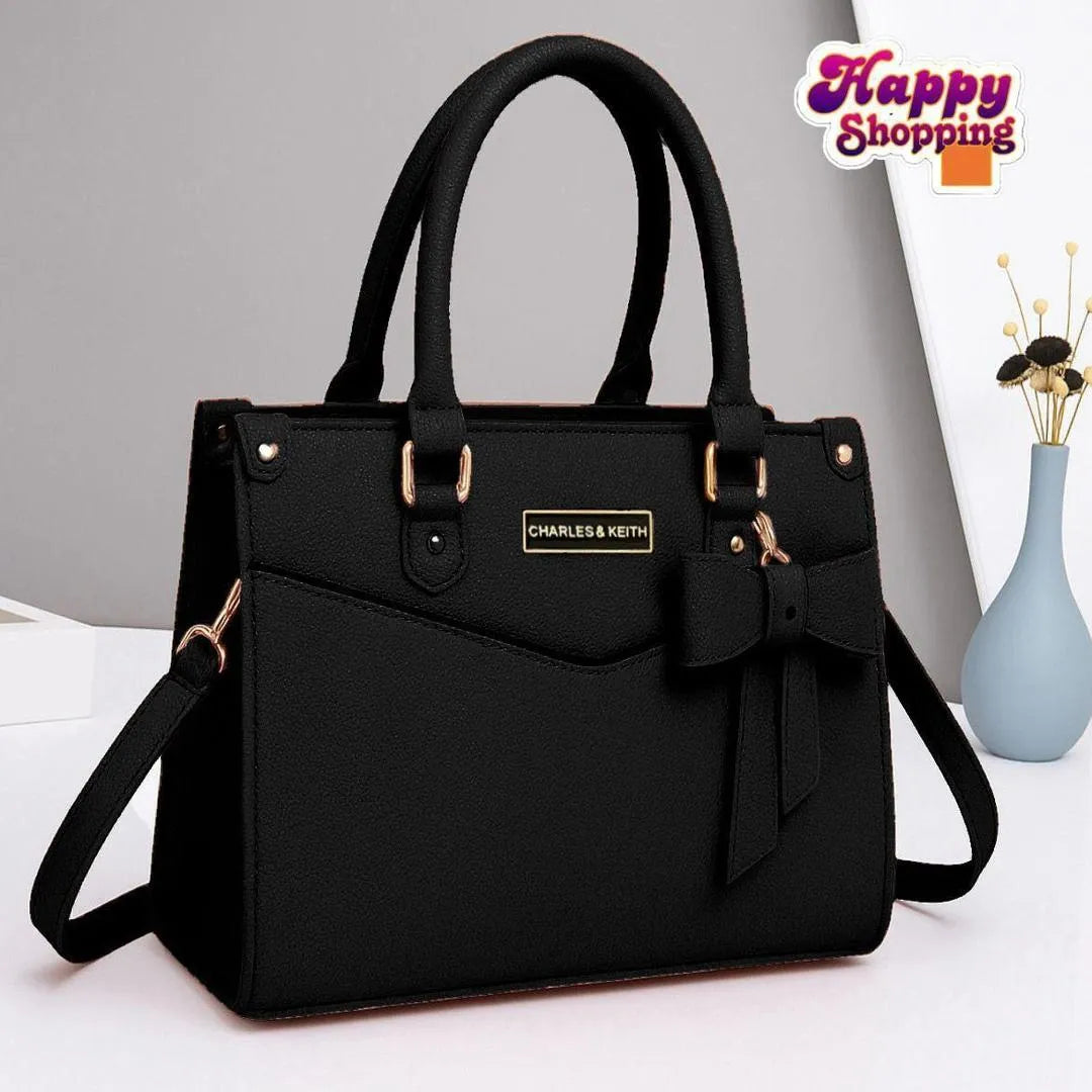Black Leather Shoulder Bag with Gold Hardware & Bow Detail